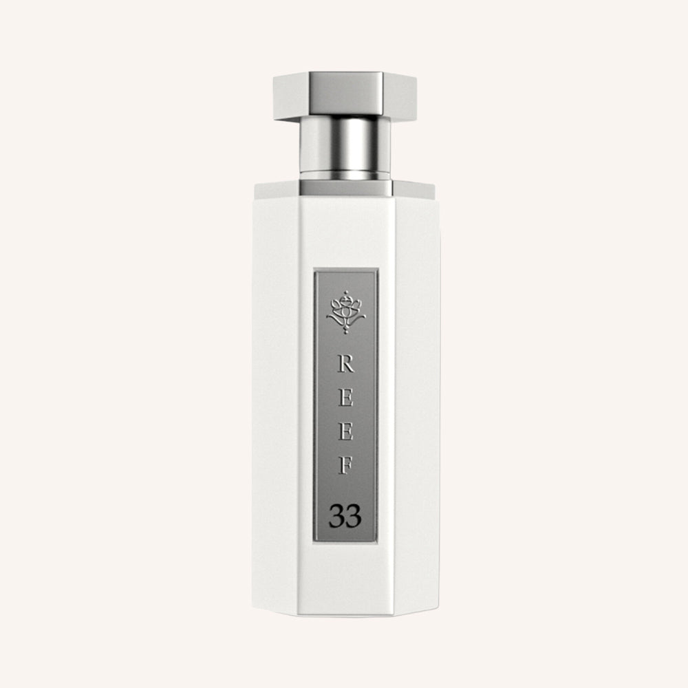 Parfum Reef 33 White – Élégance fruitée et boisée 100 ml UN ACHETE UN OFFERT